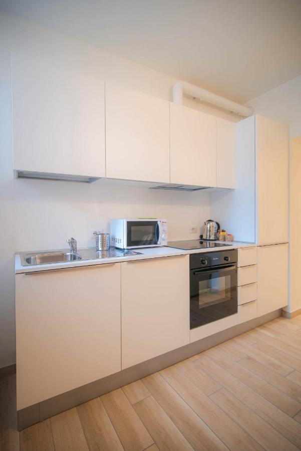 Comonfive Apartments Esterno foto